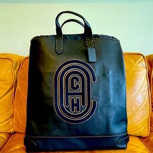 Barely used Coach Academy Drawstring Backpack with Coach Patch (76155)